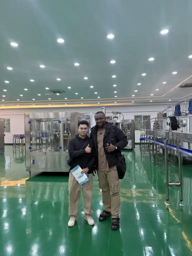 Group photo of customers touring the factory
